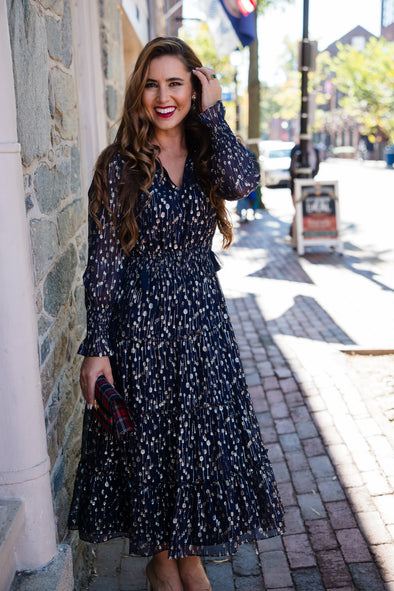 Outdoor model in the Sail to Sable Smocked Midi Dress - Navy Clip Dot