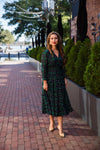Outdoor model in the Sail to Sable Smocked Waist Midi Dress - Blackwatch Plaid