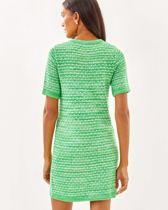 Back view of the Lilly Pulitzer Theodorah Sweater Dress - Fauna Green Metallic Marl. A mini dress with short sleeves, in a green and slightly metallic knit. 