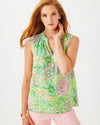 Model in the Lilly Pulitzer Sleeveless Elsa Top - Fauna Green - Lime Feeling Good. A sleeveless top with ruching at the collar and button closures 