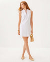 Full body view of the smiling model in the Lilly Pulitzer Elsey Shift - Resort White - Leafy Knit Pucker Jacquard. A mini sleeveless dress with a ruffled collar and v neck