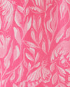 Fabric and pattern of the Model in the Lilly Pulitzer Daphnie Tunic Dress - Rousseau Pink - Tulip To Tango Enginee. A 3/4 sleeve mini dress with a collar and v neck with button closure 