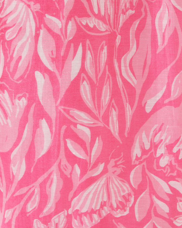 Fabric and pattern of the Model in the Lilly Pulitzer Daphnie Tunic Dress - Rousseau Pink - Tulip To Tango Enginee. A 3/4 sleeve mini dress with a collar and v neck with button closure 
