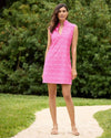 Model standing outside in the Jude Connally Kristen Dress - Garden Gate Spring Light Pink