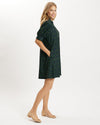 Full body side view of model in the Jude Connally Emerson Dress - Garden Lattice Navy/Loden