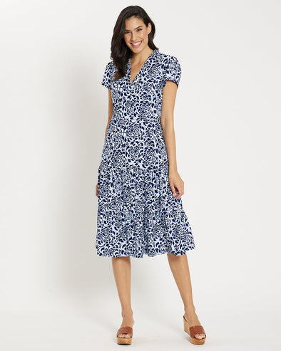 Smiling model in the Jude Connally Libby Dress - Blooms Navy