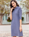 Smiling model in the Jude Connally Susanna Dress - Dancing Links Navy
