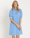 Front view of the Jude Connally Stasha Ponte Bluebell. With puff sleeves, and a standing ruffled collar