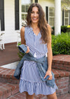 Front view of outdoor model in the Cabana Life Essentials Navy Stripe Smocked Waist Dress