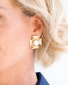 Model in the Susan Shaw Maltese Cross Pearl Stud Earrings
