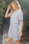 Outdoor model in the Kennedy Tweed Dress in Ice Blue