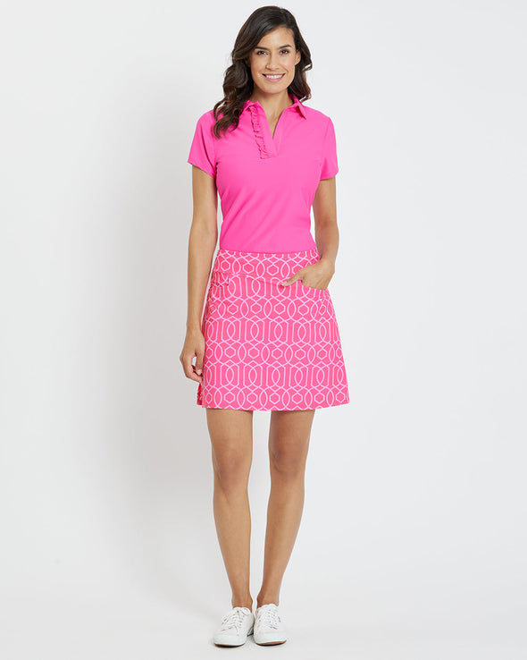 Full body view of model in the Jude Connally Sonia Skort - Garden Gate Spring Light Pink