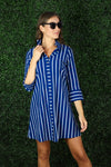 Model in the Duffield Lane Oaklee Dress - Navy/ White Stripe
