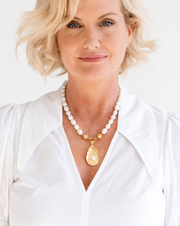 Model in the Susan Shaw Pearl Oyster Necklace with Gold Oyster and Freshwater Pearl