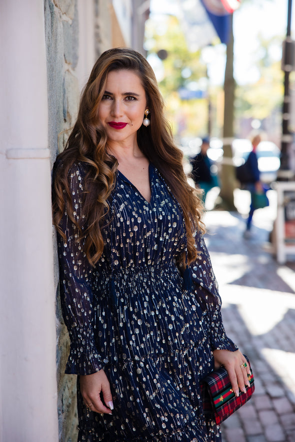 Outdoor model in the Sail to Sable Smocked Midi Dress - Navy Clip Dot
