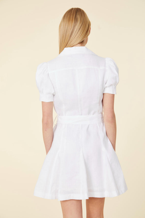 Back view of model in the Dolce Cabo Mirabelle Dress in white 