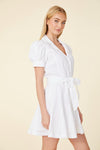Full view of model in the Dolce Cabo Mirabelle Dress in white 