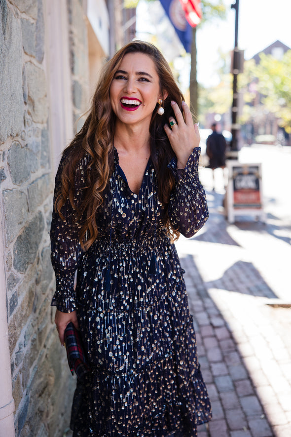 Outdoor model in the Sail to Sable Smocked Midi Dress - Navy Clip Dot