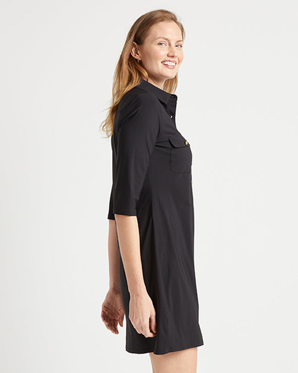 Side view of model in the Jude Connally Sloane Dress - Black