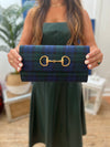 Model holding the Lisi Lerch Pegasus Clutch
