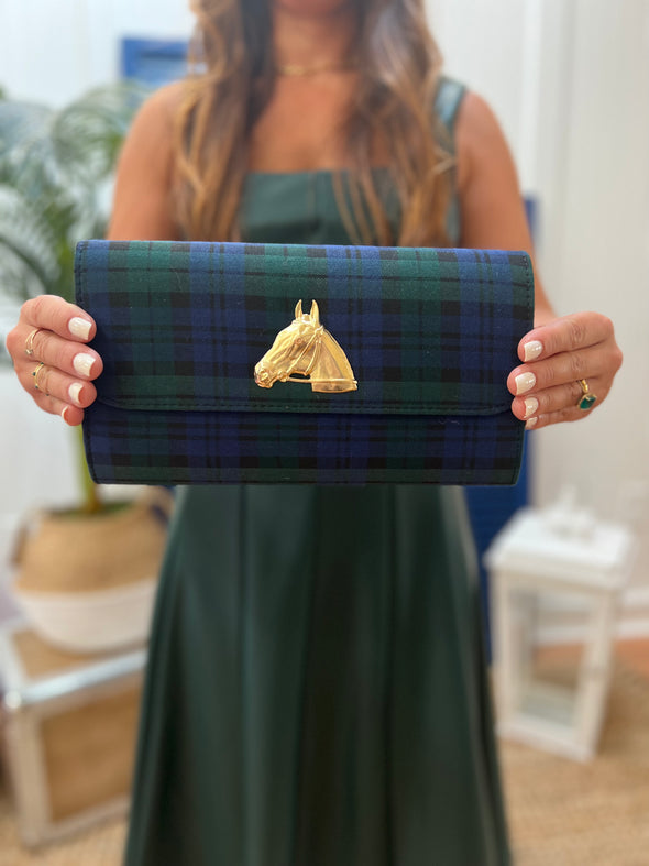 Model holding the Lisi Lerch Secretariat Clutch