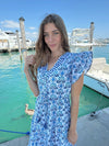 Model at a marina in the Islapayal Amalfi Maxi Dress - Hellenic Blue