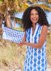 Smiling model in the Cabana Life San Sebastian Sleeveless Tunic Dress