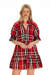 Model wearing Duffield Lane Skye Dress in Red Plaid with white background