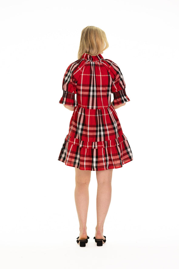 Back view of tiered red black and white plaid three quarter sleeve dress