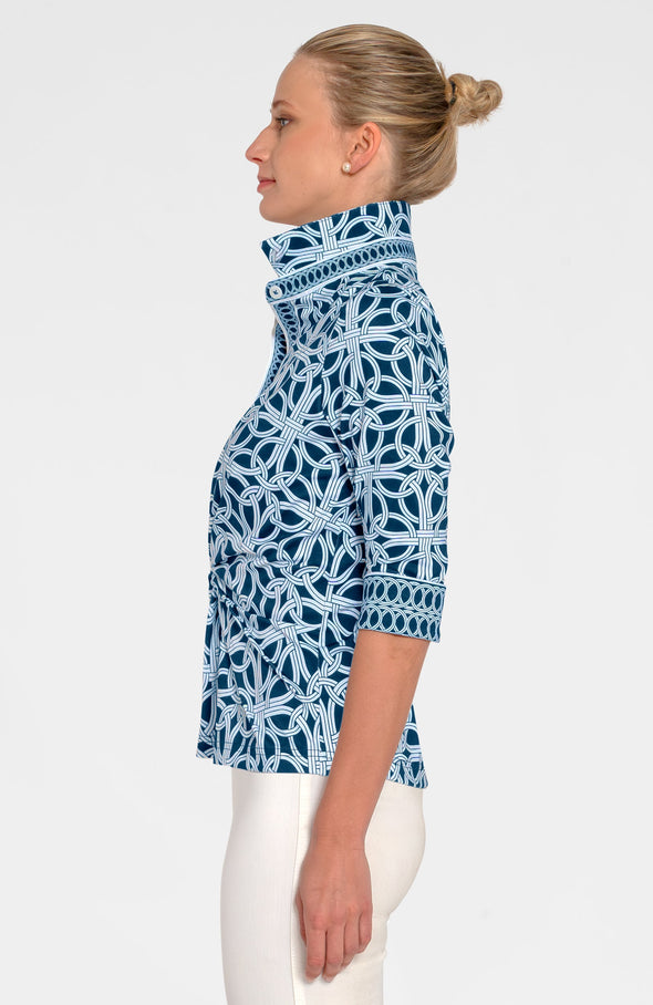 Side view of model in the Gretchen Scott Twist & Shout Top - Ring Toss - Navy
