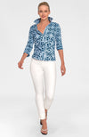 Full body view of model in Gretchen Scott Twist & Shout Top - Ring Toss - Navy paired with white pants and white open toe sandals