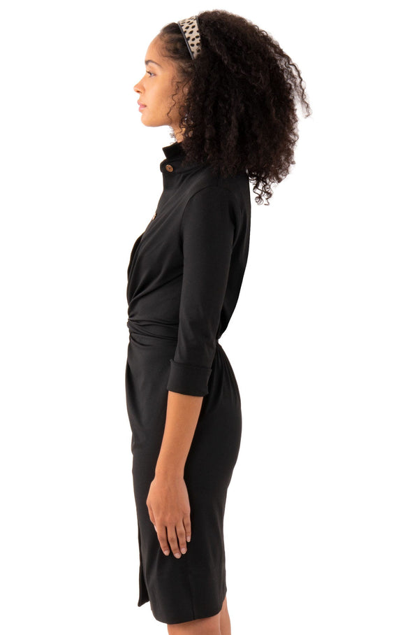 Side view of the Gretchen Scott Twist & Shout Dress - Solid Black