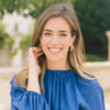 Model in the Brennan Greek Keys Hoop Earrings - Worn Gold