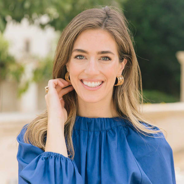 Model in the Brennan Greek Keys Hoop Earrings - Worn Gold