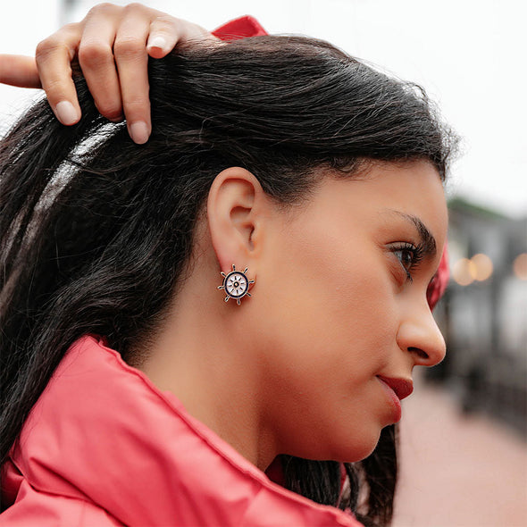 Model in the Bridget Enamel Nautical Ship's Wheel Stud Earrings - Navy & White
