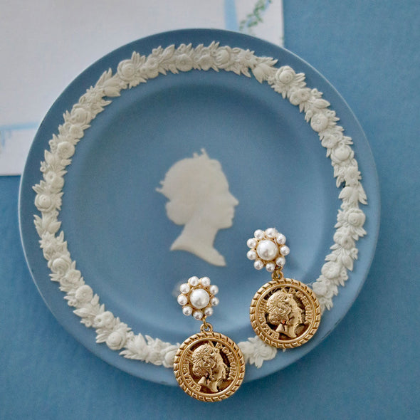 Flat view of the Queen Elizabeth Coin Pearl Drop Earrings - Worn Gold