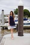 Outdoor model in the Duffield Lane Carroll Dress - Navy/White