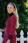 Side view of the Sail to Sable Tunic Dress in Red Plaid