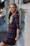 Side view of the Gretchen Scott Ruff Neck Jersey Dress - Duke Of York - Black/Multi