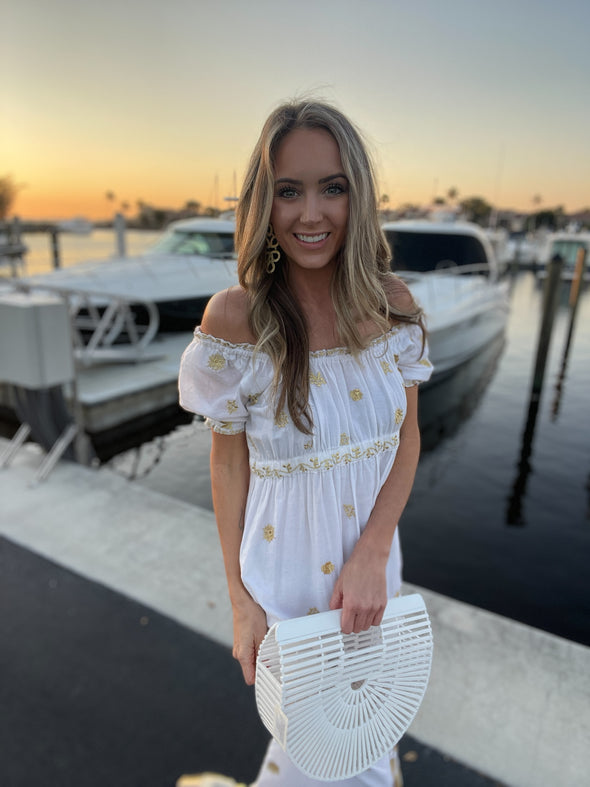 Model in Gretchen Scott Big Love Maxi Dress in White/Gold