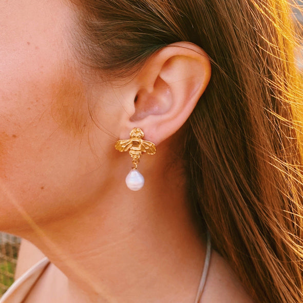 Model in the Susan Shaw Handcast Bee + Pearl Drop Earrings