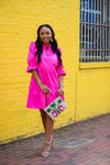 Outdoor model in the Gretchen Scott Teardrop Dress - Faille - Pink