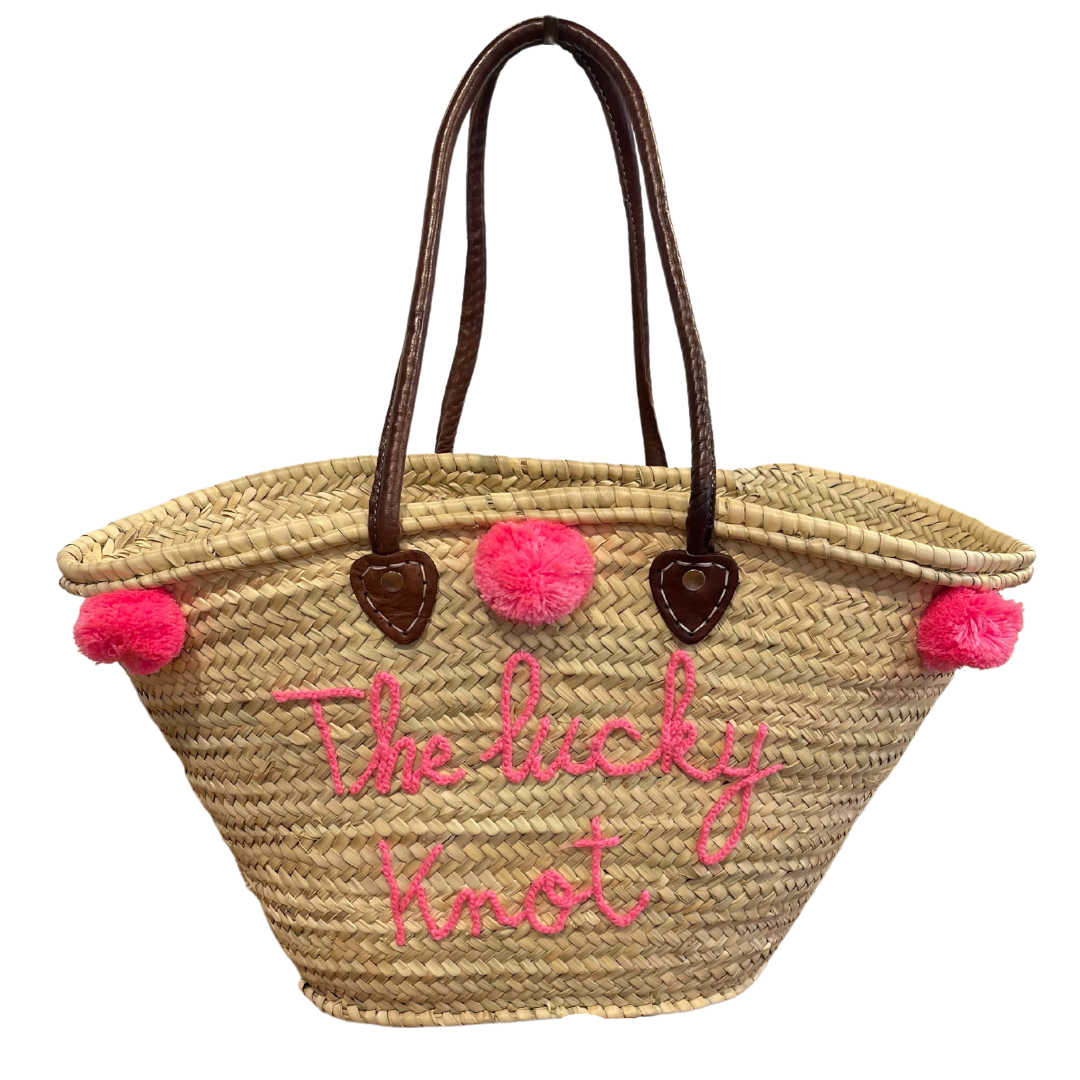Straw beach bag with pom poms 2025