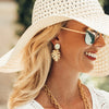 Model in the Susan Shaw Tropical Palm Leaf Earrings