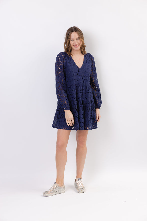 Full body view of the Sail To Sable Navy Floral Eyelet Long Sleeve V-Neck Dress