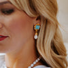 Model in the Susan Shaw Charlotte Mini Drop Earrings in Parisian Blue