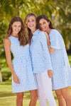 Three models, left wearing Jude Connally Rachel Dress in Ikat Diamond Peri