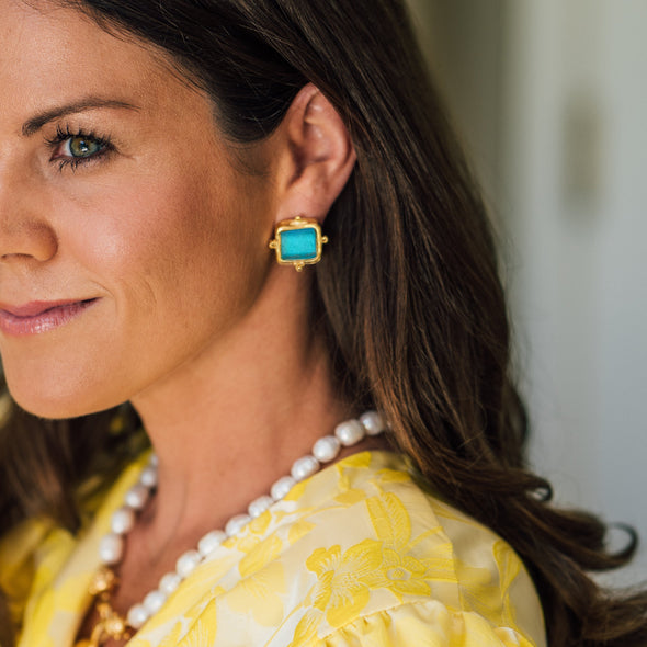 Model in the Susan Shaw Madeline Stud Earrings in Classic Blue