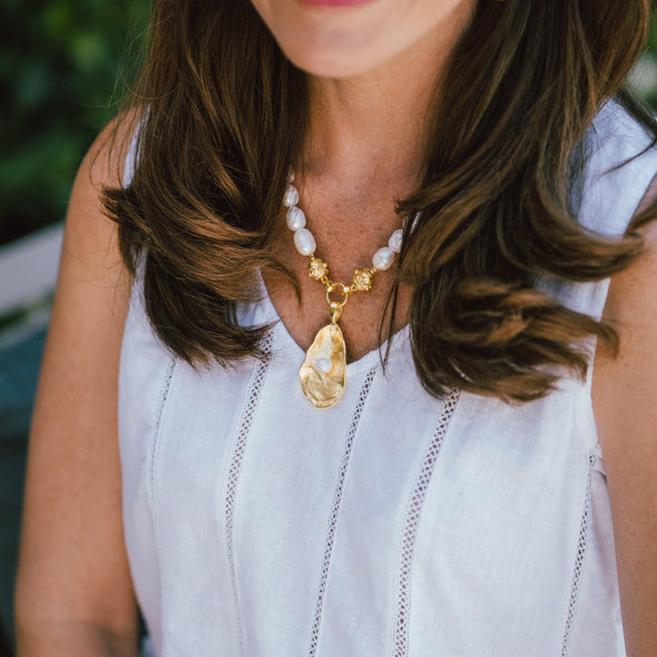 Model in the Susan Shaw Pearl Oyster Necklace with Gold Oyster and Freshwater Pearl