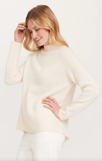 Model in the Tyler Böe Cashmere Button Back Sweater - Ivory